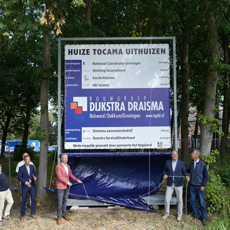 Onthulling bouwbord